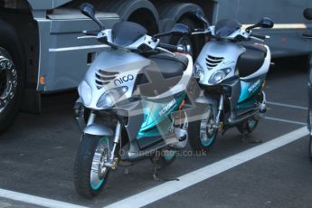 © 2012 Octane Photographic Ltd. Barcelona Winter Test 2 Day 1 - Thursday 1st March 2012. Nico Rosberg and Michael Schumacher'spaddock scooters. Digital Ref : 0231cb1d1687