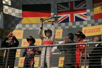 World © Octane Photographic Ltd. Formula 1 USA, Circuit of the Americas - Podium - Lewis Hamilton and Martin Whitmarsh (McLaren), Sebastian Vettel (Red Bull) and Fernando Alonso (Ferrari) on the podium. 18th November 2012 Digital Ref: 0561lw1d4803