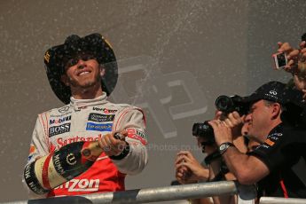 World © Octane Photographic Ltd. Formula 1 USA, Circuit of the Americas - Podium - Lewis Hamilton sprays his champaign, Vodafone McLaren Mercedes. 18th November 2012 Digital Ref: 0561lw1d4939