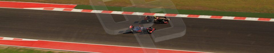 World © Octane Photographic Ltd. F1 USA - Circuit of the Americas - Saturday Morning Practice - FP3. 17th November 2012. Vodafone McLaren Mercedes MP427 - Jenson Button and Lotus E20 - Romain Grosjean. Digital Ref: 0559lw7d3660