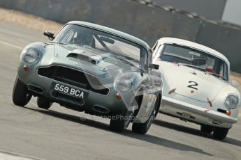 © Octane Photographic Ltd. 2012 Donington Historic Festival. Pre-63 GT, qualifying. Aston Martin DB4GT - Martin Stretton and Porsche 356 Carrera 2 GT - Carlo Vogele. Digital Ref : 0322cb1d9543