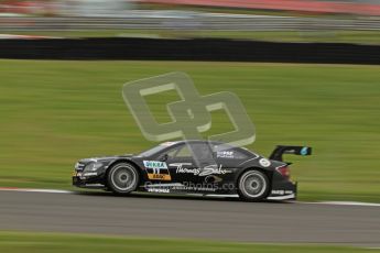 © Octane Photographic Ltd. 2012. DTM – Brands Hatch - Friday Afternoon Practice. Gary Paffett catches some air whilst pushing hard - Mercedes AMG C-Coupe - Thomas Sabo Mercedes AMG. Digital Ref :