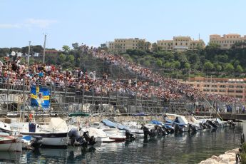 © Octane Photographic Ltd. 2012. F1 Monte Carlo - Qualifying - Session 1. Saturday 26th May 2012. The Ronnie Peterson fan club get a great view at the swimming pool grandstand. Digital Ref : 0355cb7d8753