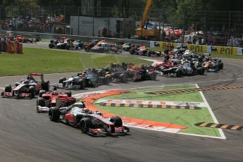 World © Octane Photographic Ltd. Formula 1 Italian GP, 9th September 2012. Lewis Hamilton leads the pack through turns 1 and 2 in his McLaren MP4/27. Digital Ref : 0518lw1d9088