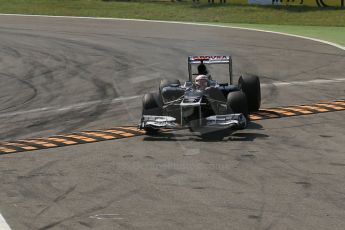 World © Octane Photographic Ltd. Formula 1 Italian GP, 9th September 2012. Pastor Maldonado jumps the speed bumps in his Williams FW34. Digital Ref : 0518lw1d9357