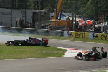 World © Octane Photographic Ltd. Formula 1 Italian GP, 9th September 2012. Jean-Eric Vergne on teh grass after a suspension failure - heading for big air in his Toro Rosso STR7. Digital Ref : 0518lw1d9517