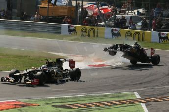 World © Octane Photographic Ltd. Formula 1 Italian GP, 9th September 2012. Jean-Eric Vergne launches off the curb after a suspension failure - grabbing big air in his Toro Rosso STR7. Digital Ref : 0518lw1d9522