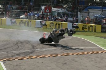 World © Octane Photographic Ltd. Formula 1 Italian GP, 9th September 2012. Jean-Eric Vergne launches off the curb after a suspension failure - grabbing big air in his Toro Rosso STR7. Digital Ref : 0518lw1d9525