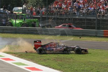 World © Octane Photographic Ltd. Formula 1 Italian GP, 9th September 2012. Jean-Eric Vergne after a huge launch in his Toro Rosso STR7, later complaining of back pain. Digital Ref : 0518lw1d9532