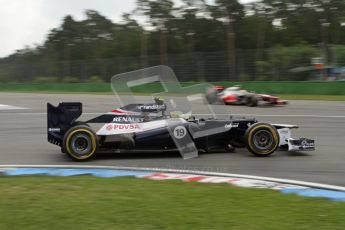 © 2012 Octane Photographic Ltd. German GP Hockenheim - Saturday 21st July 2012 - F1 Practice 3. Williams FW34 - Bruno Senna passes the rejoining Lewis Hamilton's McLaren. Digital Ref : 0416lw7d7296