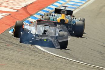 © 2012 Octane Photographic Ltd. German GP Hockenheim - Sunday 22nd July 2012 - F1 Race. McLaren MP4/27 - Lewis Hamilton with a shredded rear left is passed by the Caterham of Heikki Kovalainen. Digital Ref : 0423lw1d4974