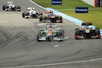 © 2012 Octane Photographic Ltd. German GP Hockenheim - Sunday 22nd July 2012 - F1 Race. Lotus E20 - Kimi Raikkonen and the © 2012 Octane Photographic Ltd. German GP Hockenheim - Sunday 22nd July 2012 - F1 Race. Force India VJM05 of Paul di Resta battle into the hairpin. Digital Ref : 0423lw1d5030