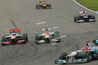 © 2012 Octane Photographic Ltd. German GP Hockenheim - Sunday 22nd July 2012 - F1 Race. Force India VJM05 -  Nico Hulkenberg is taken by Jenson Button's McLaren into the hairpin as Pastor Maldonado and Mark Webber start to fall back. Digital Ref : 0423lw1d5224