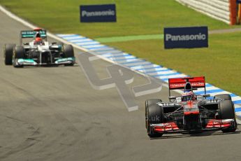 © 2012 Octane Photographic Ltd. German GP Hockenheim - Sunday 22nd July 2012 - F1 Race. McLaren MP4/27 - Jenson Button pulls away from Michael Schumacher's Mercedes. Digital Ref : 0423lw1d5352