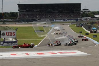 © 2012 Octane Photographic Ltd. German GP Hockenheim - Sunday 22nd July 2012 - F1 Race. Ferrari F2012 - Fernando Alonso leads the pack on the opening lap - as Sebastian Vettel slides up the inside of Michael Schumacher under braking. Digital Ref : 0423lw7d8559