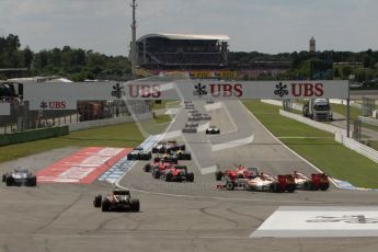 © 2012 Octane Photographic Ltd. German GP Hockenheim - Sunday 22nd July 2012 - F1 Race. Bruno Senna and Romain Grosjean run wide around the hairpin on the opening lap. Digital Ref : 0423lw7d8620