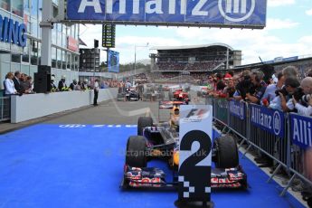 © 2012 Octane Photographic Ltd. German GP Hockenheim - Sunday 22nd July 2012 - F1 Podium -  Sebastian Vettel pulls at in the pitane after finishing 2nd. Vettel was later dropped to 5th with a penalty for overtaking Button off the track in the final laps. Digital Ref : 0421lw7d6403