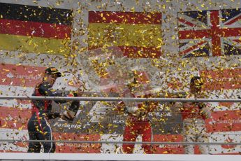 © 2012 Octane Photographic Ltd. German GP Hockenheim - Sunday 22nd July 2012 - F1 Podium - Fernando Alonso - Winner (Ferrari) alongside Sebastian Vettel, 2nd (Red Bull), and Jenson Button 3rd. Vettel was later dropped to 5th with a penalty for overtaking Button  (McLaren) off the track in the final laps. Digital Ref : 0421lw7d9348