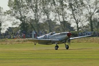 World © 2012 Octane Photographic Ltd. Goodwood Revival. September 15th 2012. Spitfire landing. Digital Ref : 0521cb1d9868