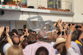 © 2012 Octane Photographic Ltd. Hungarian GP Hungaroring - Sunday 29th July 2012 - F1 Podium. Jubilant team members grabbing their share of the podium celebrations. Digital Ref :