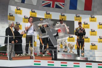 © 2012 Octane Photographic Ltd. Hungarian GP Hungaroring - Sunday 29th July 2012 - F1 Podium. Lewis Hamilton - Race winner, Sam Michael, Kimi Raikkonen, 2nd and Romain Grosjean, 3rd. Digital Ref :