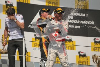 © 2012 Octane Photographic Ltd. Hungarian GP Hungaroring - Sunday 29th July 2012 - F1 Podium. Lewis Hamilton - Race winner, Sam Michael and Kimi Raikkonen, 2nd. Digital Ref :