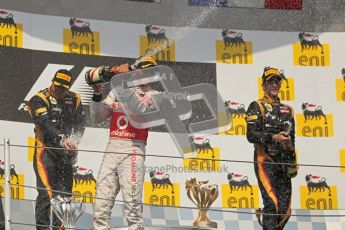 © 2012 Octane Photographic Ltd. Hungarian GP Hungaroring - Sunday 29th July 2012 - F1 Podium. Lewis Hamilton - Race winner, Kimi Raikkonen, 2nd and Romain Grosjean, 3rd, spray the champaign. Digital Ref :