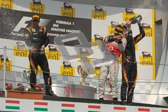 © 2012 Octane Photographic Ltd. Hungarian GP Hungaroring - Sunday 29th July 2012 - F1 Podium. Lewis Hamilton - Race winner, Kimi Raikkonen, 2nd and Romain Grosjean, 3rd, spray the champaign. Digital Ref :