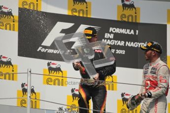 © 2012 Octane Photographic Ltd. Hungarian GP Hungaroring - Sunday 29th July 2012 - F1 Podium. Lewis Hamilton - Race winner, and Kimi Raikkonen, 2nd, spray the champaign. Digital Ref :