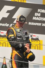 © 2012 Octane Photographic Ltd. Hungarian GP Hungaroring - Sunday 29th July 2012 - F1 Podium. Lewis Hamilton - Kimi Raikkonen, 2nd checks the time. Digital Ref :