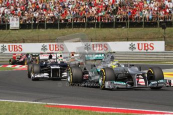 © 2012 Octane Photographic Ltd. Hungarian GP Hungaroring - Sunday 29th July 2012 - F1 Race. Mercedes W03 - Michael Schumacher and Williams FW34 - Pastor Maldonado. Digital Ref :