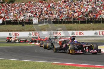 © 2012 Octane Photographic Ltd. Hungarian GP Hungaroring - Sunday 29th July 2012 - F1 Race. Toro Rosso STR7 - Daniel Ricciardo and Caterham CT01 - Heikki Kovalainen. Digital Ref :