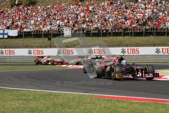 © 2012 Octane Photographic Ltd. Hungarian GP Hungaroring - Sunday 29th July 2012 - F1 Race. Toro Rosso STR7 - Daniel Ricciardo and Caterham CT01 - Heikki Kovalainen. Digital Ref :