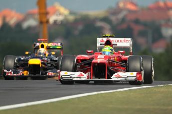 © 2012 Octane Photographic Ltd. Hungarian GP Hungaroring - Friday 27th July 2012 - F1 Practice 1. Felipe Massa - Ferrari F2012 check to see where Vetel's Red Bull RB8 is in his mirror. Digital Ref : 0425lw1d4525