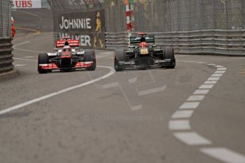 © Octane Photographic Ltd. 2012. F1 Monte Carlo - Race. Sunday 27th May 2012. Jenson Button - McLaren and Heikki Kovalainen - Caterham, going wheel to wheel up Casino Hill. Digital Ref : 0357cb7d0326