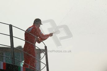 World © Octane Photographic Ltd. Formula 1 Italian GP, Podium ceremony 9th September 2012. Fernando Alondo sprays champaign to Ferrari's beloved Tiffosi. Digital Ref : 0519lw1d9167