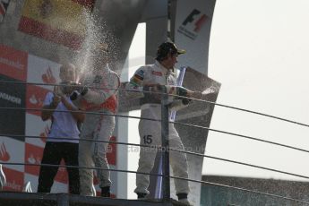 World © Octane Photographic Ltd. Formula 1 Italian GP, Podium ceremony 9th September 2012. Lewis Hamilton (McLaren) and Sergio Perez (Sauber) spray the bubbles. Digital Ref : 0519lw1d9193