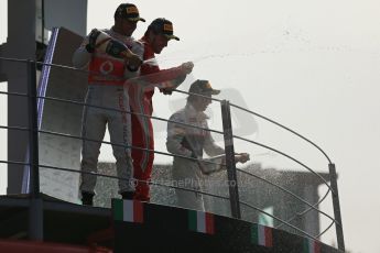 World © Octane Photographic Ltd. Formula 1 Italian GP, Podium ceremony 9th September 2012. Fernando Alonso (Ferrari), Lewis Hamilton (McLaren) and Sergio Perez (Sauber) spray the bubbles. Digital Ref : 0519lw1d9208