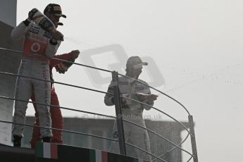 World © Octane Photographic Ltd. Formula 1 Italian GP, Podium ceremony 9th September 2012. Fernando Alonso (Ferrari), Lewis Hamilton (McLaren) and Sergio Perez (Sauber) spray the bubbles. Digital Ref : 0519lw1d9214