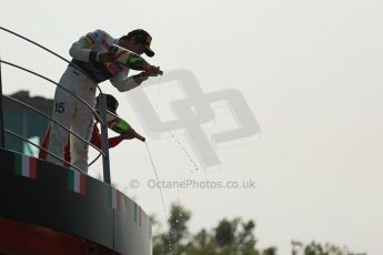 World © Octane Photographic Ltd. Formula 1 Italian GP, Podium ceremony 9th September 2012. Last drops to the crowd from Lewis Hamilton (McLaren) and Fernando Alonso (Ferrari). Digital Ref : 0519lw1d9262