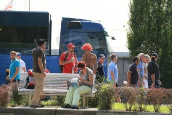 World © Octane Photographic Ltd. Formula 1 Italian GP, Press Conference 6th September 2012 - The Tifossi grad a beer in the sun. Digital Ref : 0494lw1d9021