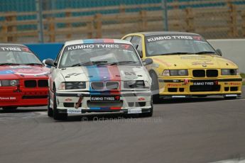 © Octane Photographic Ltd. Motors TV day – Donington Park,  Saturday 31st March 2012. Kumho BMW Championship, Stuart Laws - BMW E36 M3 and James Cannon - BMW Compact. Digital ref : 0266cb1d9386