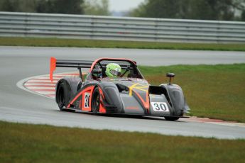 © Jones Photography. OSS Championship Round 1, Snetterton, 28th April 2012. Darcy Smith, Radical SR4. Digital Ref: 0390CJ7D0147