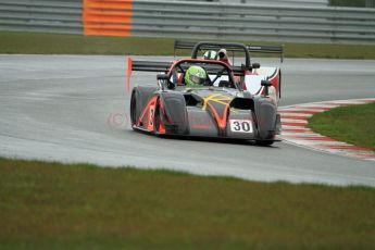 © Jones Photography. OSS Championship Round 1, Snetterton, 28th April 2012. Darcy Smith, Radical SR4. Digital Ref: 0390CJ7D0202