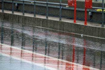 © Jones Photography. OSS Championship Round 1, Snetterton, 29th April 2012. A river running down the pitlane. Digital Ref: 0390CJ7D1089