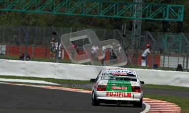 © Carl Jones / Octane Photographic Ltd. Silverstone Classic. Fujifilm Touring Car Trophy 1970-2000. 22nd July 2012. Frank Wrathall, Vauxhall Cavalier, Silverstone Classic. Digital Ref : 0415CJ7D1675