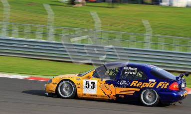 © Carl Jones / Octane Photographic Ltd. Silverstone Classic. Fujifilm Touring Car Trophy 1970-2000. Alvin Powell, Ford Prodrive. 21st July 2012. Digital Ref : 0414CJ7D1180