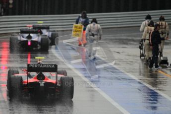 © 2012 Octane Photographic Ltd. British GP Silverstone - Friday 6th July 2012 - GP2 Practice - The pack head out onto a soaking wet track. Digital ref : 0398lw1d2341