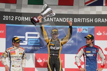 © 2012 Octane Photographic Ltd. British GP Silverstone - Saturday 7th July 2012 - GP2 Race 1, Johnny Cecotto, Esteban Gutierrez celebrating with his winner's trophy and Jolyon Palmer on the podium. Digital Ref : 0400lw7d6689