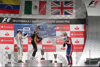 © 2012 Octane Photographic Ltd. British GP Silverstone - Saturday 7th July 2012 - GP2 Race 1 champagne fight with Johnny Cecotto, Esteban Gutierrez and Jolyon Palmer. Digital Ref : 0400lw7d6750